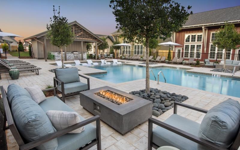 a pool with a fire pit